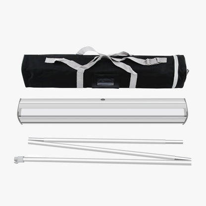 Retractable banner stand kit with padded carrying case, aluminum base, and support poles for portable trade show and event displays.