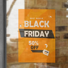 Custom printed perforated window film with Black Friday sale design, applied to storefront glass for promotional advertising.
