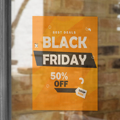 Custom printed perforated window film with Black Friday sale design, applied to storefront glass for promotional advertising.