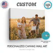 Canvas wall art of a family in a field with promotional text about customization and shipping, including a free hanging kit.