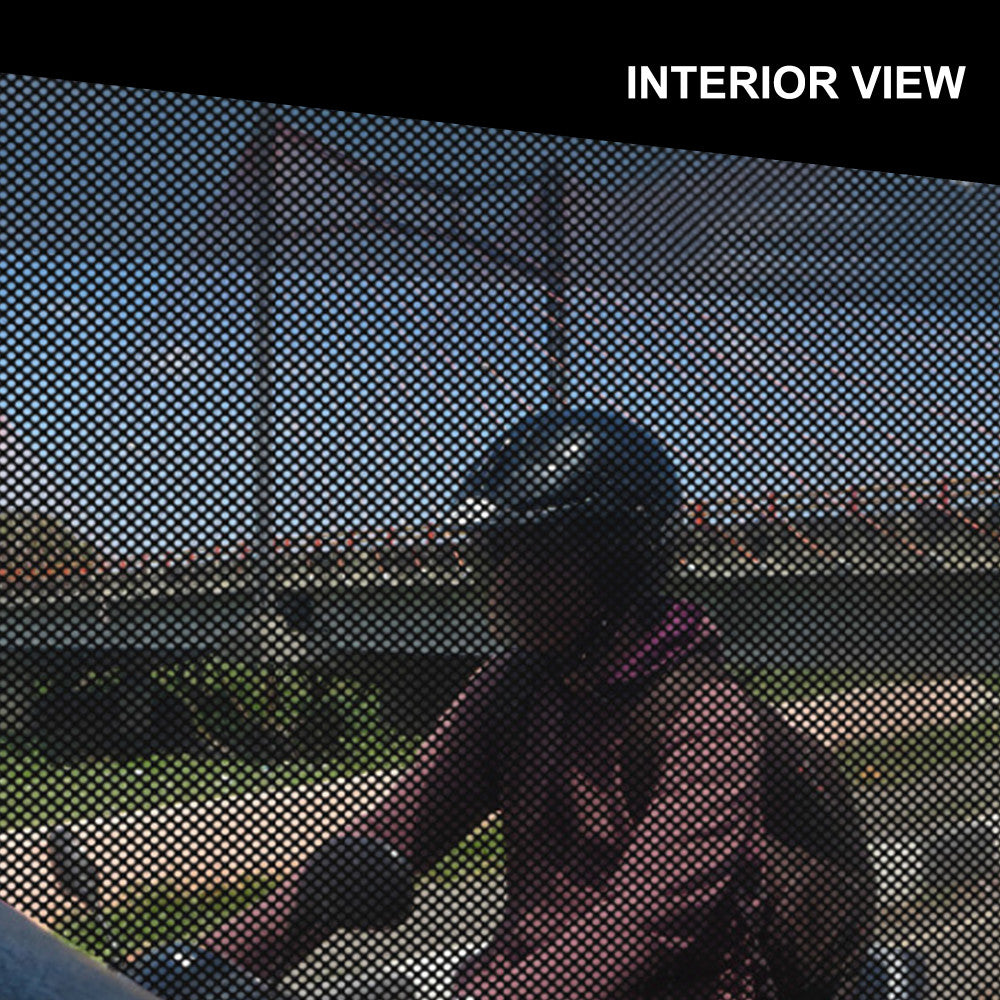 Interior view through perforated window film, showing one-way visibility from inside while maintaining privacy and natural light.