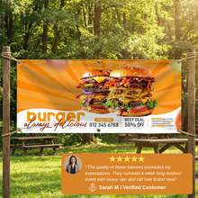 Custom vinyl banner with double cheeseburger image and restaurant promotion, orange background, sample for custom banner printing reading 'burger always delicious, order now, best deal 50% off'