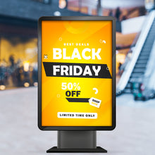 Custom printed backlit film with Black Friday sale design, illuminated in a lightbox display at a shopping mall.